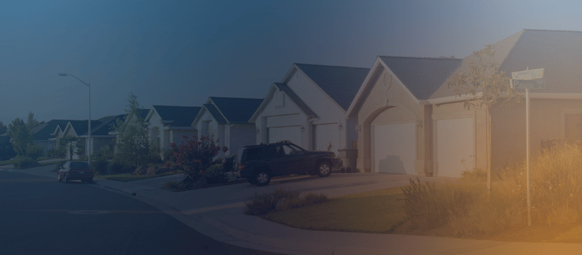 Suburban homes in a quiet neighborhood, representing trust and estate real estate services.